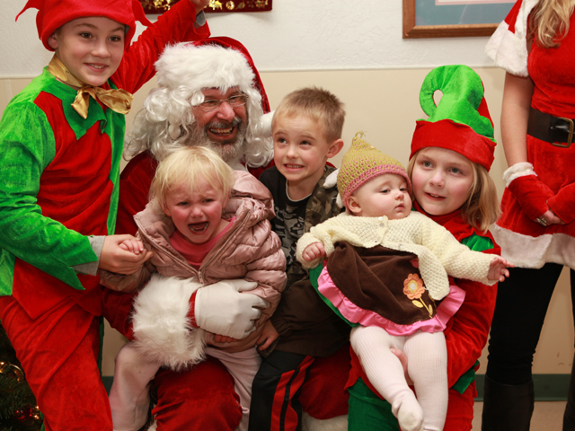 Father Christmas with kids at Christmas tree lighting